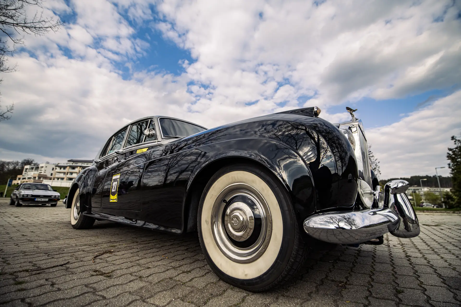 Classic car navigating a sharp turn