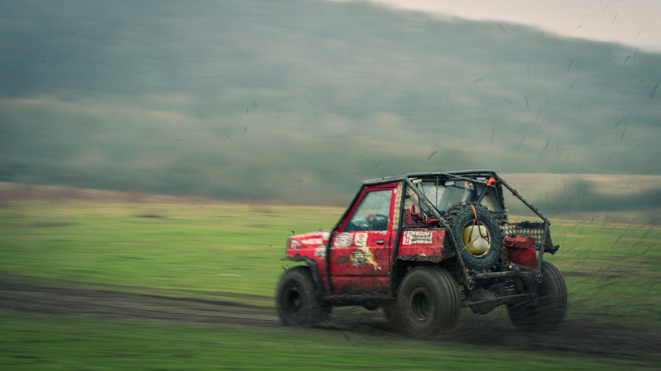 Offroad vehicle splashing through water